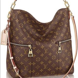 Louis Vuitton Millie monogrammed bag NEW CONDITION